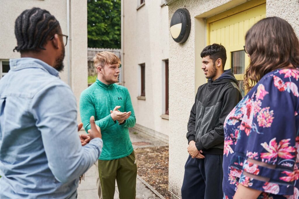 Young people talking in a group