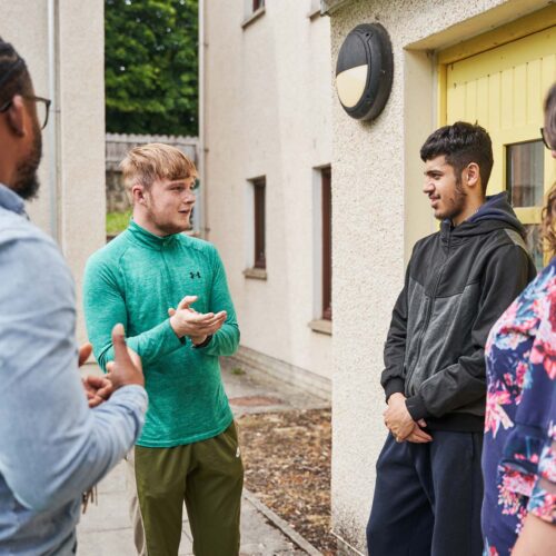 Young people talking in a group