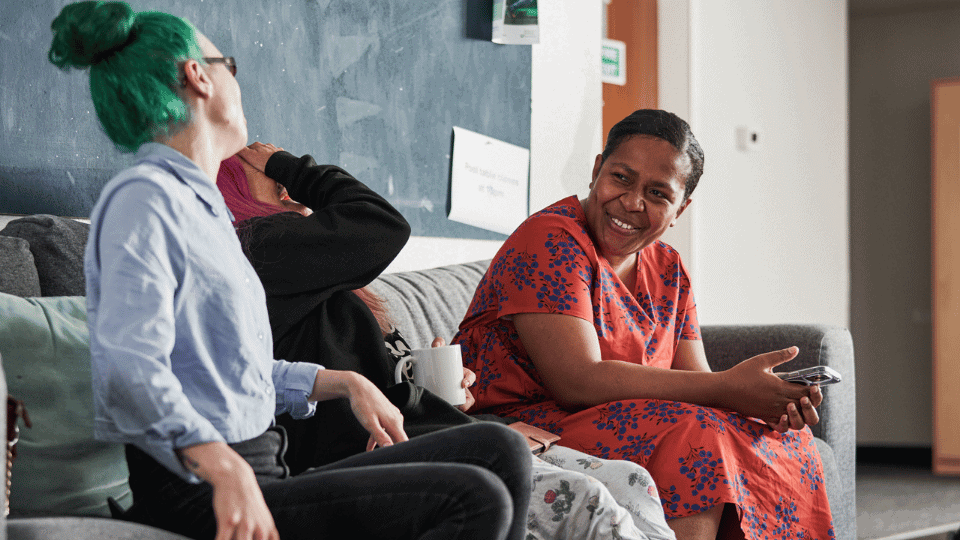 Care Support Scotland - three ladies have a laugh in a shared community space