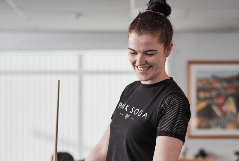 Care Support Scotland - Resident enjoys a game of pool