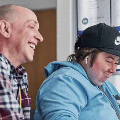 Care Support Scotland - Support worker helps resident get online