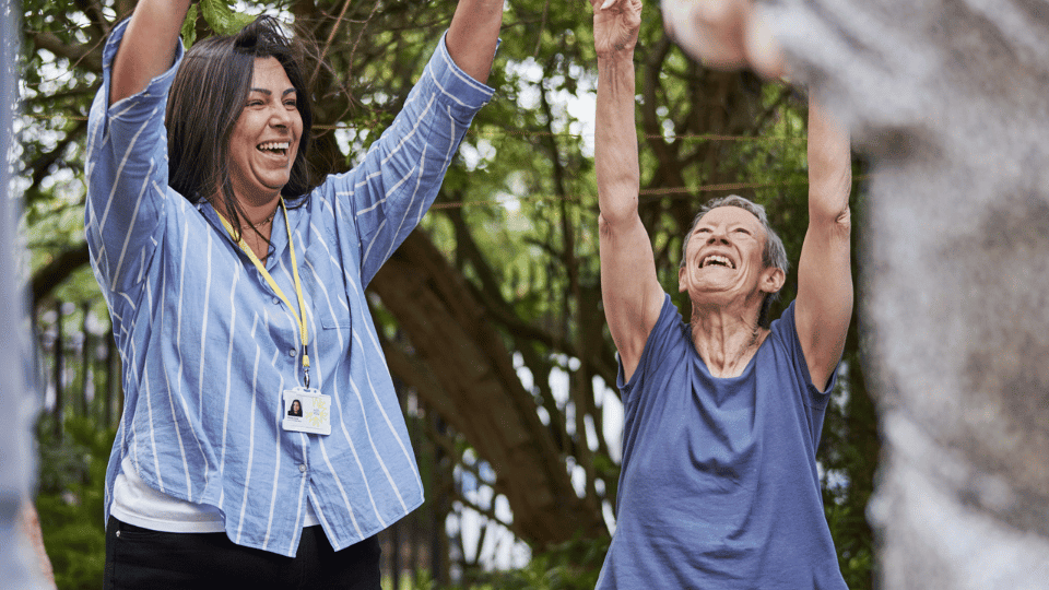 Care Support Scotland - outside residents enjoy groups activities to keep healthy